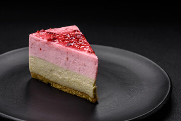 Delicious sweet dessert cheesecake with raspberry and pistachio flavor