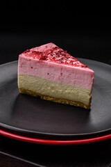 Delicious sweet dessert cheesecake with raspberry and pistachio flavor