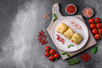 Delicious healthy vegetarian vegetable roll of zucchini, tomatoes, peppers and sauce