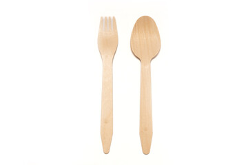 Wooden fork and spoon, isolated background.