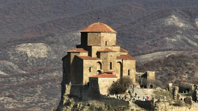 Flying around the historic Jvari monastery from 6th century in Mtskheta, Georgia. Aerial drone footage