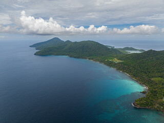 Fototapeta premium Top view of coast of the island of Weh with bays and lagoons. Tropical landscape. Aceh, Indonesia.