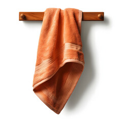 A rich rust-colored towel hangs casually from a simple wooden rack, offering a sense of warmth and domestic elegance on a white background
