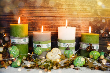 christmas still life with candle and decorations - fourth advent