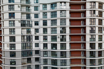 Fototapeta premium Monolithic frame construction of the building. Family mortgage. Shooting from a drone. Modern construction of a residential building. construction site close up. Multi-storey building. .