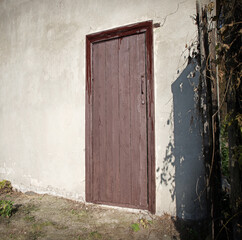 Old wooden door to a vintage dwelling