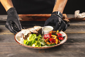 Chef finishing his plate
