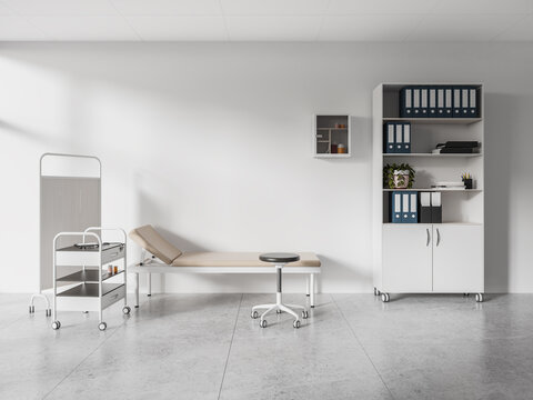 White doctor office interior with examination couch
