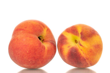 Fototapeta na wymiar Two ripe organic peaches, macro, isolated on white background.