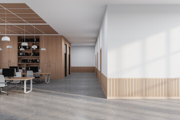 White and wooden open space office with blank wall