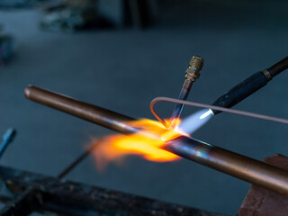 soldering copper pipes with a gas burner 