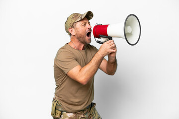 Middle age military with dog tag isolated on white background shouting through a megaphone