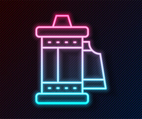 Glowing neon line Camera vintage film roll cartridge icon isolated on black background. 35mm film canister. Filmstrip photographer equipment. Vector