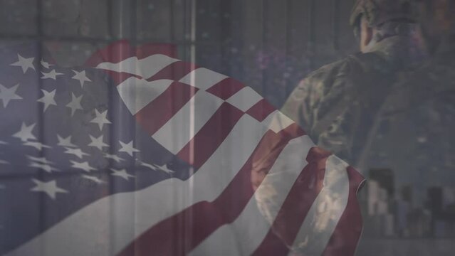 Animation of flag of usa over diverse soldiers