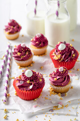 Delicious and homemade red cupcakes made of raspberries.