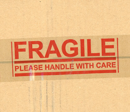 fragile handle with care brown corrugated cardboard box