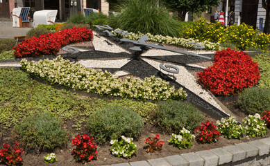 Flower clock at Market square in Puck. Poland
