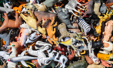 Toy box filled with various animals	