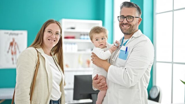 Caucasian mother with baby on a doctor appointment at clinic