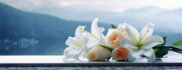 Beautiful white flowers, roses and lilies , over serene blue background.