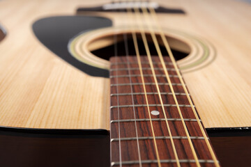 an acoustic guitar Close-up, classic instrument, music education and study.