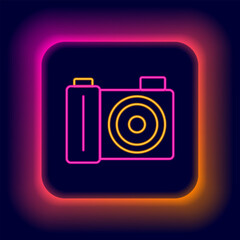 Glowing neon line Photo camera icon isolated on black background. Foto camera. Digital photography. Colorful outline concept. Vector