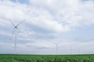 Agricultural field with wind turbines