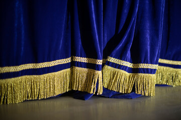 Blue Curtain. Curtain on stage. Blue fabric.