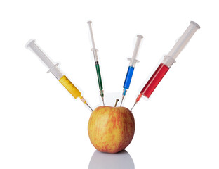 Apple with a syringe filled with chemicals