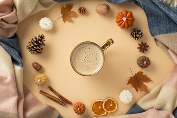 Feel the warmth of covering in soft knitted blanket with a cup of hot drink at home in autumn with...