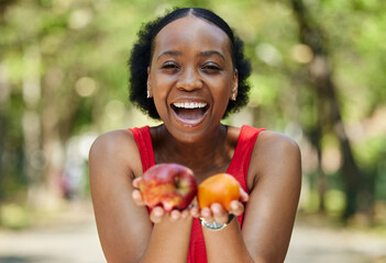 Apple, orange and portrait of a black woman with a fruit on a farm with fresh produce in summer and smile for wellness. Citrus, nutrition and young female person on an organic diet for self care