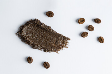 A smudge swatch smear of the brown coffee body scrub. Texture background. Product presentation marketing