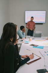 Fototapeta premium Business woman writing notes