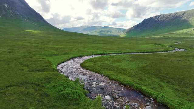 Buachaille Etive M&ograve;r and Waterfall from a drone, River Coupall, Glen Etive and River Etive, Highlands, Scotland, UK