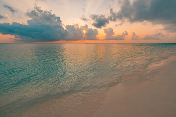 Fototapeta premium Sunset sea sand beach waves closeup. Panoramic travel landscape. Inspire tropical island coast seascape horizon, fantastic sky clouds sun rays. Colorful summer sunrise background, relax calm peace bay