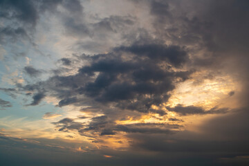 Naklejka na ściany i meble Magical dramatic sky with clouds and sunset light.