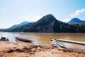 Ban Pak Ou Pier Overlooking the Mekong River and Pak Ou Caves or Tam-Ting and blue sky , Luang...