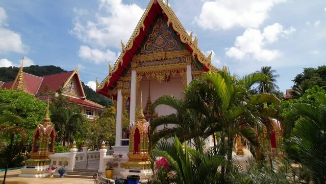 Drone photography of Wat Suwan Khiri Khet Karon temple, translation: 'Buddhist company joint venture to build', gold decorations, dragons, Buddhism. Religion and traditions, sights, faith, historical