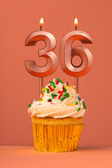 Birthday cake with candle number 36 - Coral fusion background