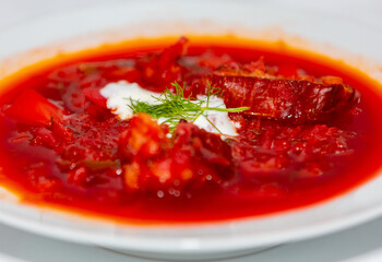 Traditional Ukrainian or Russian soup borscht on wooden table. Prudentópolis PR