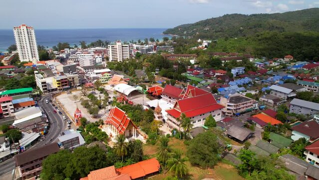 Aerial view of Karon temple, Buddhism, faith, religion, mountain and sea, road, landscape. Drone flight of Wat Suwan Khiri Khet temple, beautiful scenery and majestic buildings, traditions and culture