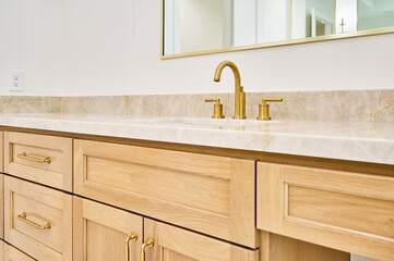 Bathroom vanity sink with wood cabinetry - 621292363