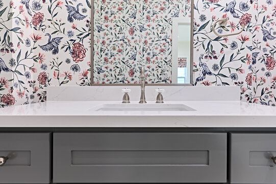 Gray and pink bathroom sink and counter
