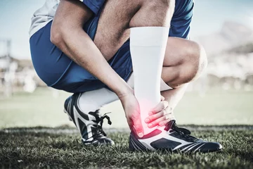 Zelfklevend Fotobehang Injury, sports and hand of a man on foot pain, soccer emergency and accident while training. Fitness, problem and an athlete or football player with inflammation or a swollen muscle on the field © Daniels C/peopleimages.com