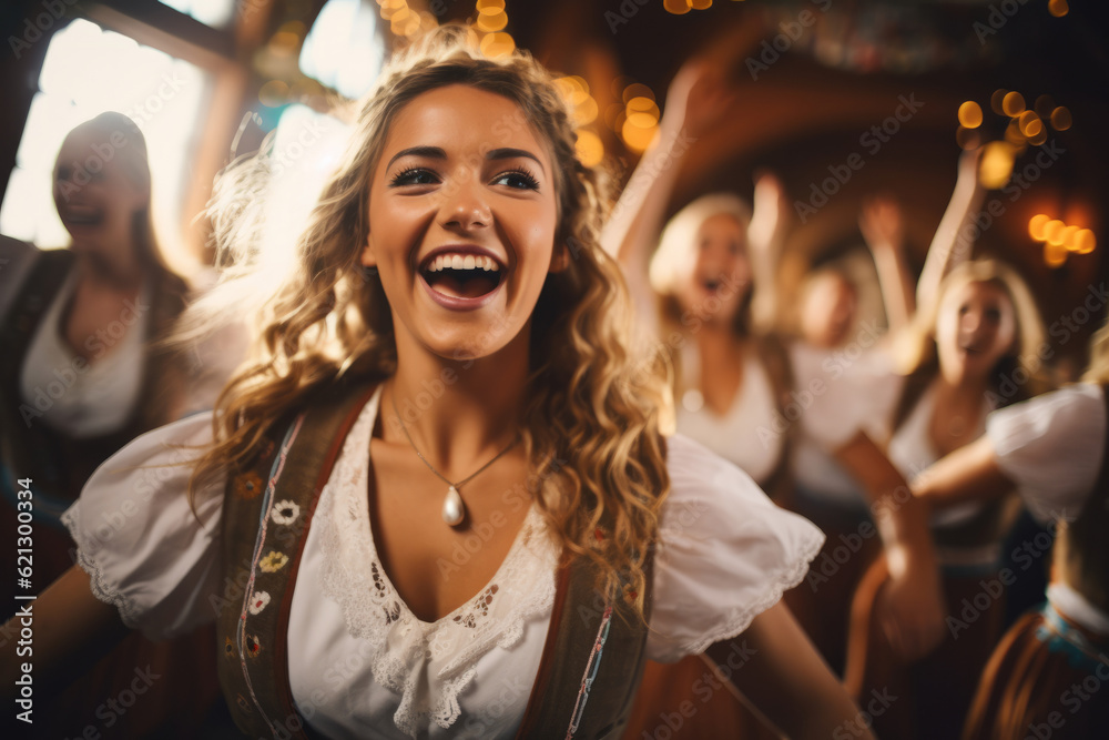 Wall mural Oktoberfest waitress having fun and dancing at a beer festival event wearing a traditional costume