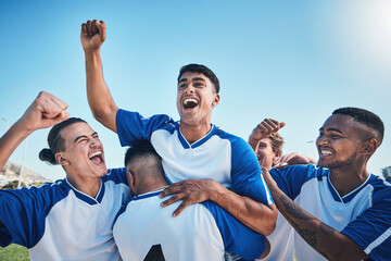 Football player, winner team and people winning in competition, game or sports goals, success and cheers. Yes, wow and excited group of young men with achievement and soccer celebration on blue sky - Powered by Adobe