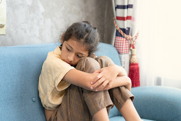 Portrait Of Upset Little Girl Sitting On Couch At Home, Depressed Preteen Female Child Having Bad Mood, Offended Kid Feeling Sad And Lonely, - 621302503