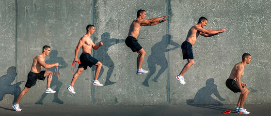 Sports set. Athlete jumps against the background of a concrete wall. Banner format. - 621302505