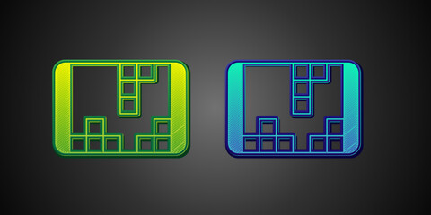 Green and blue Portable video game console icon isolated on black background. Handheld console gaming. Vector