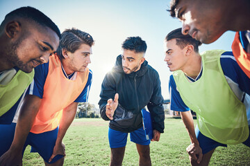 Coaching, football circle and people talking for sports teamwork, competition strategy and game on field. Listening, speaking and man, soccer player team or group motivation, goals or training advice